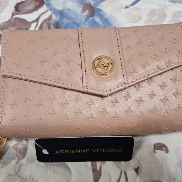 ADRIENNE VITTADINI DOULBE
ZIP PHONE WALLET - Picture 3 of 11